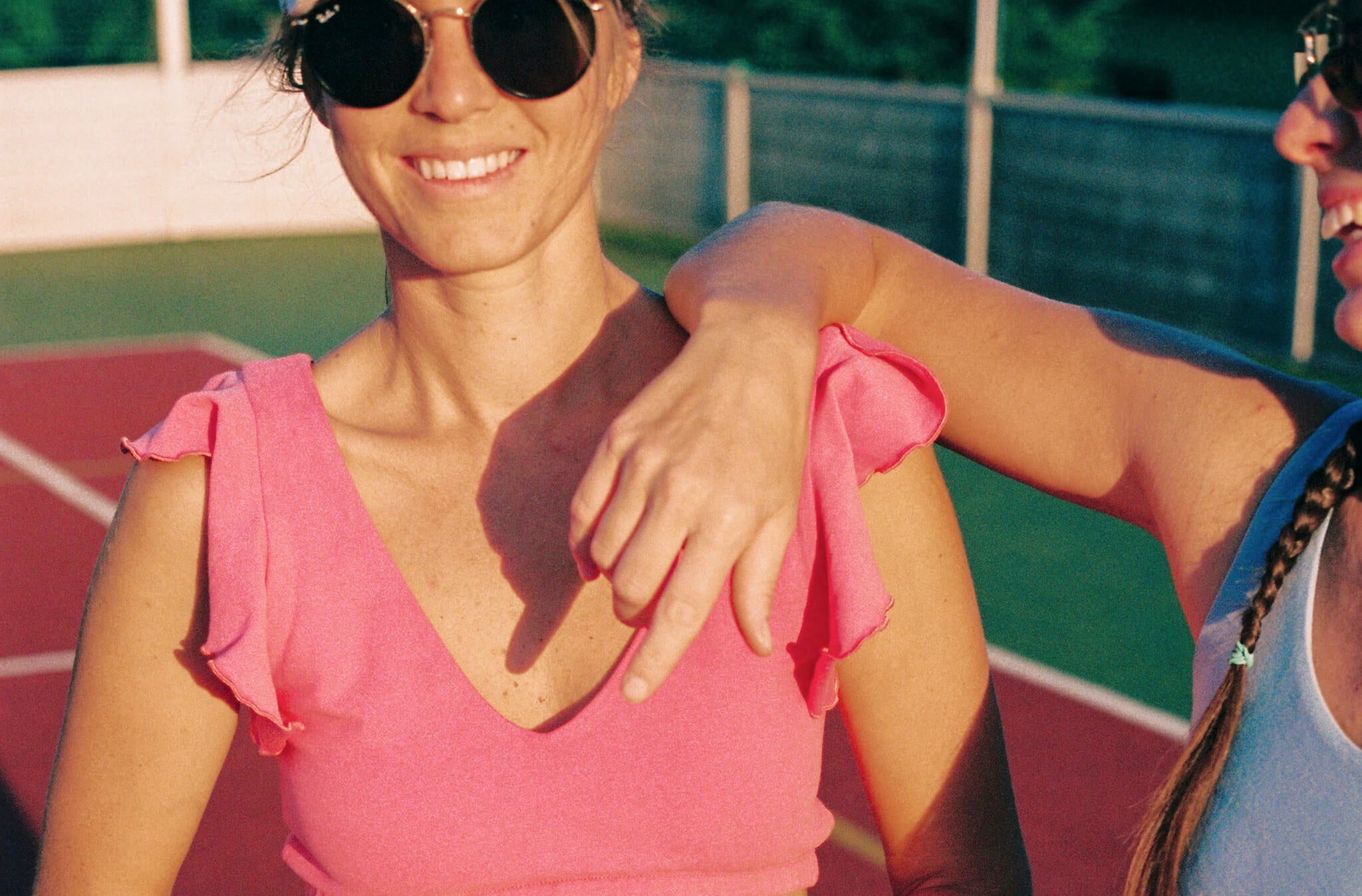 two women smiling at camera